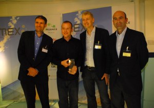 From left to right, Bob Last, Marc Holgate, Steve Ives and Conor McKenna of Taptu with their MEX Award trophy.